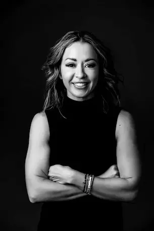 Lexi Yoo NP smiling in a black and white professional portrait