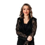 Lexi Yoo, nurse practitioner - Black lace blazer + black top, white background - general professional portrait