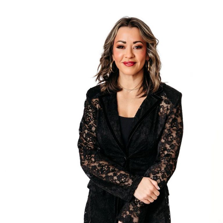 Lexi Yoo, nurse practitioner - Black lace blazer + black top, white background - general professional portrait